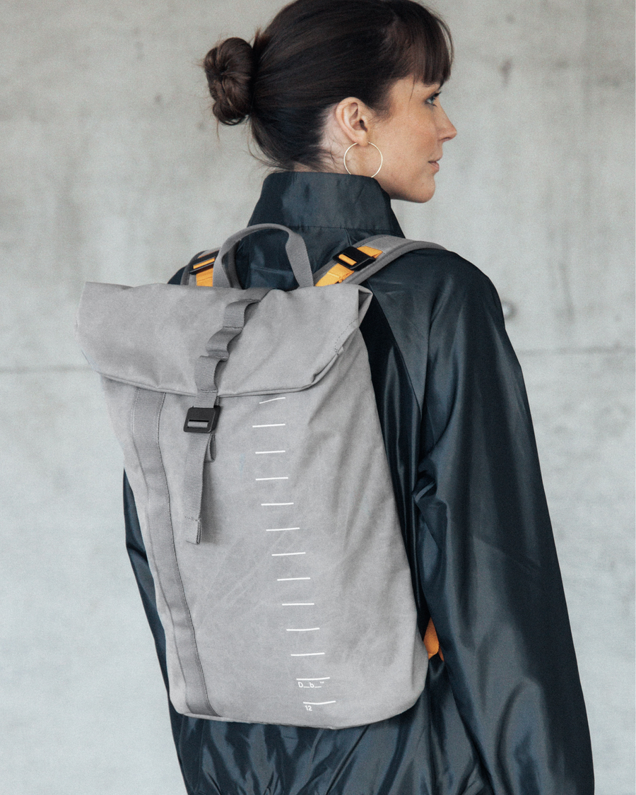 Essential Backpack 12L Sand Grey on person.png