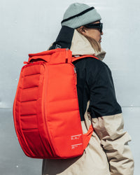 Hugger 25L_Falu Red_on person.jpg