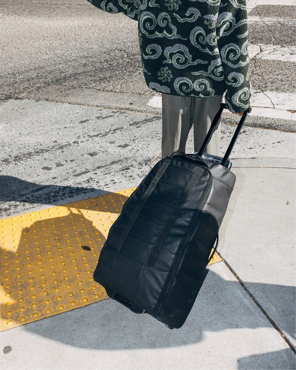 Hugger Roller Bag Check-in 60L Black Out