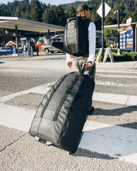 Hugger Roller Bag Check-in 90L Black Out