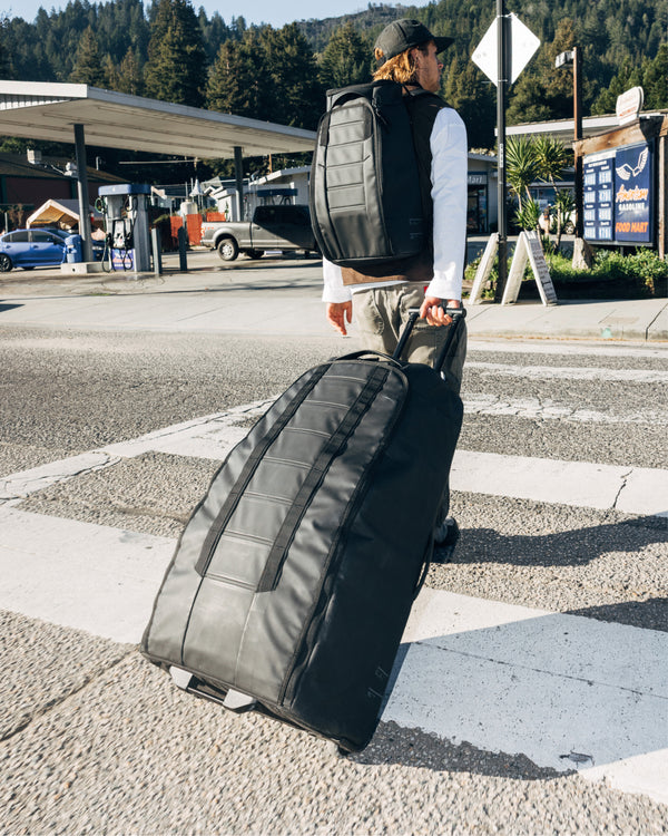Hugger Roller Bag Check-in 90L Black Out