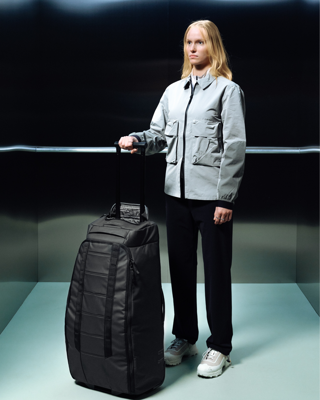 Hugger Roller Bag Check-in 60L Black Out