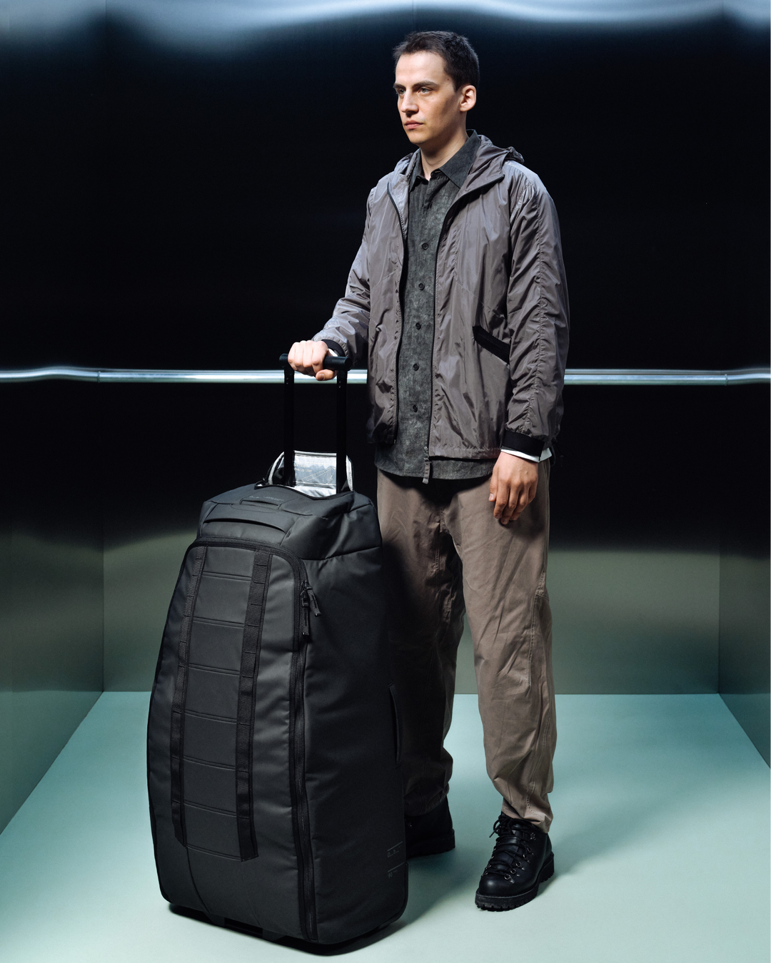 Hugger Roller Bag Check-in 90L Black Out