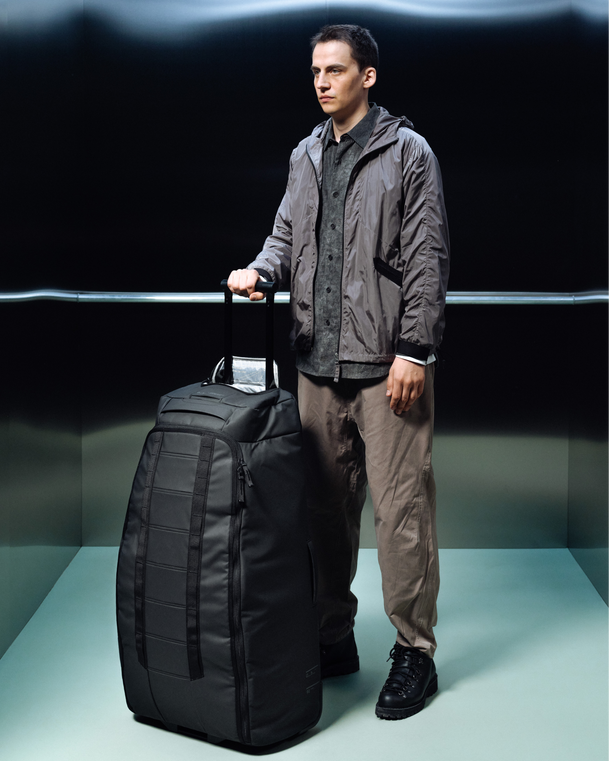 Hugger Roller Bag Check-in 90L Black Out