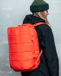 Roamer 40L_Falu Red_on person.jpg