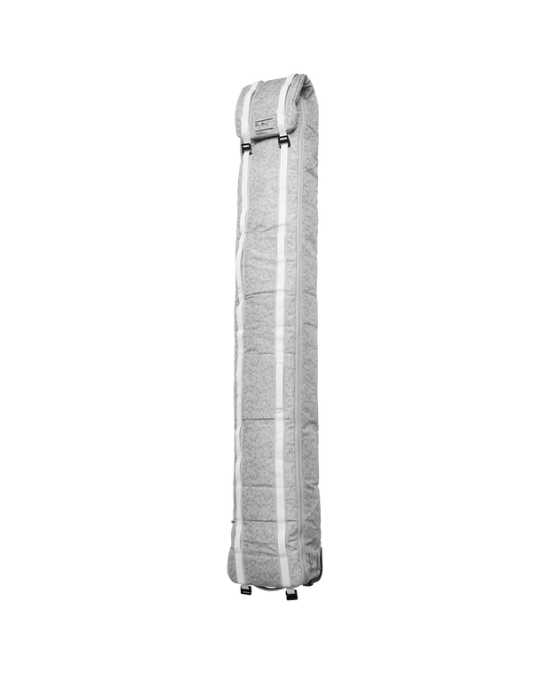 Db Snow Roller Pro 70L ski bag in textured White Noise pattern, standing upright.